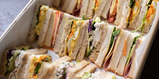Assorted deli sandwiches boxed for catering