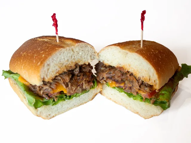 Don's Original Tri Tip sandwich with cheddar cheese, halved