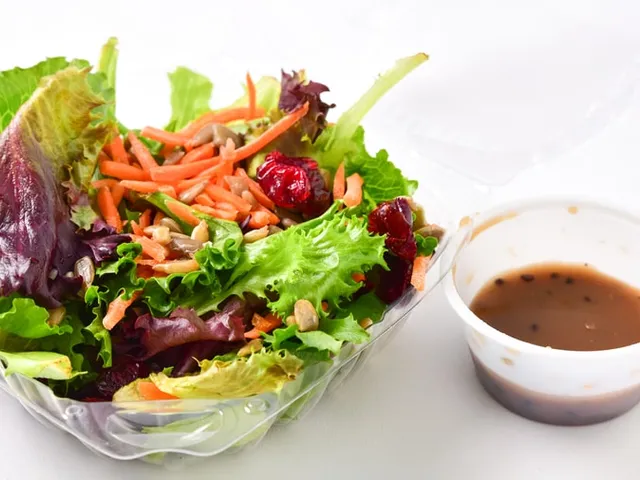 Mixed greens salad with carrots and cranberries