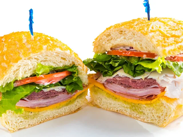 The Classic sandwich with ham, turkey, roast beef and cheddar, halved