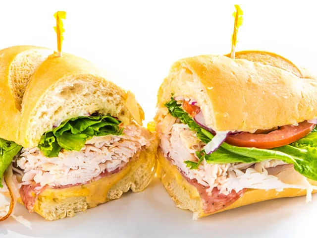 The Spice Girl sandwich with turkey, salami, pepper jack and honey mustard, halved